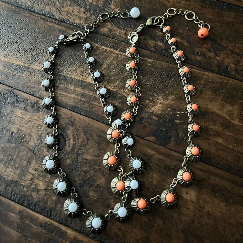 Set of Anthropologie White and Peach Graduated Antique Brass Statement Necklaces